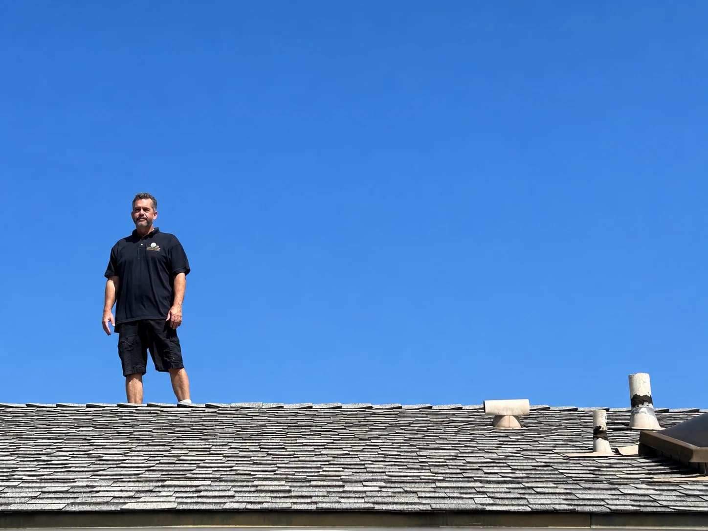 Mark Kinder of ThoroughSpec Home Inspections inspecting a roof in Orange County